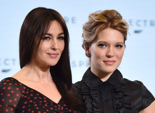 French actress Lea Seydoux (R) and Italian star Monica Bellucci (L) pose during an event to launch the 24th James Bond film 'Spectre' at Pinewood Studios at Iver Heath in Buckinghamshire, west of London, on December 4, 2014. French actress Lea Seydoux and Italian star Monica Bellucci will star alongside Britain's Daniel Craig in the new James Bond film 'Spectre', the producers said on December 4 at the historic Pinewood Studios. AFP PHOTO / BEN STANSALL